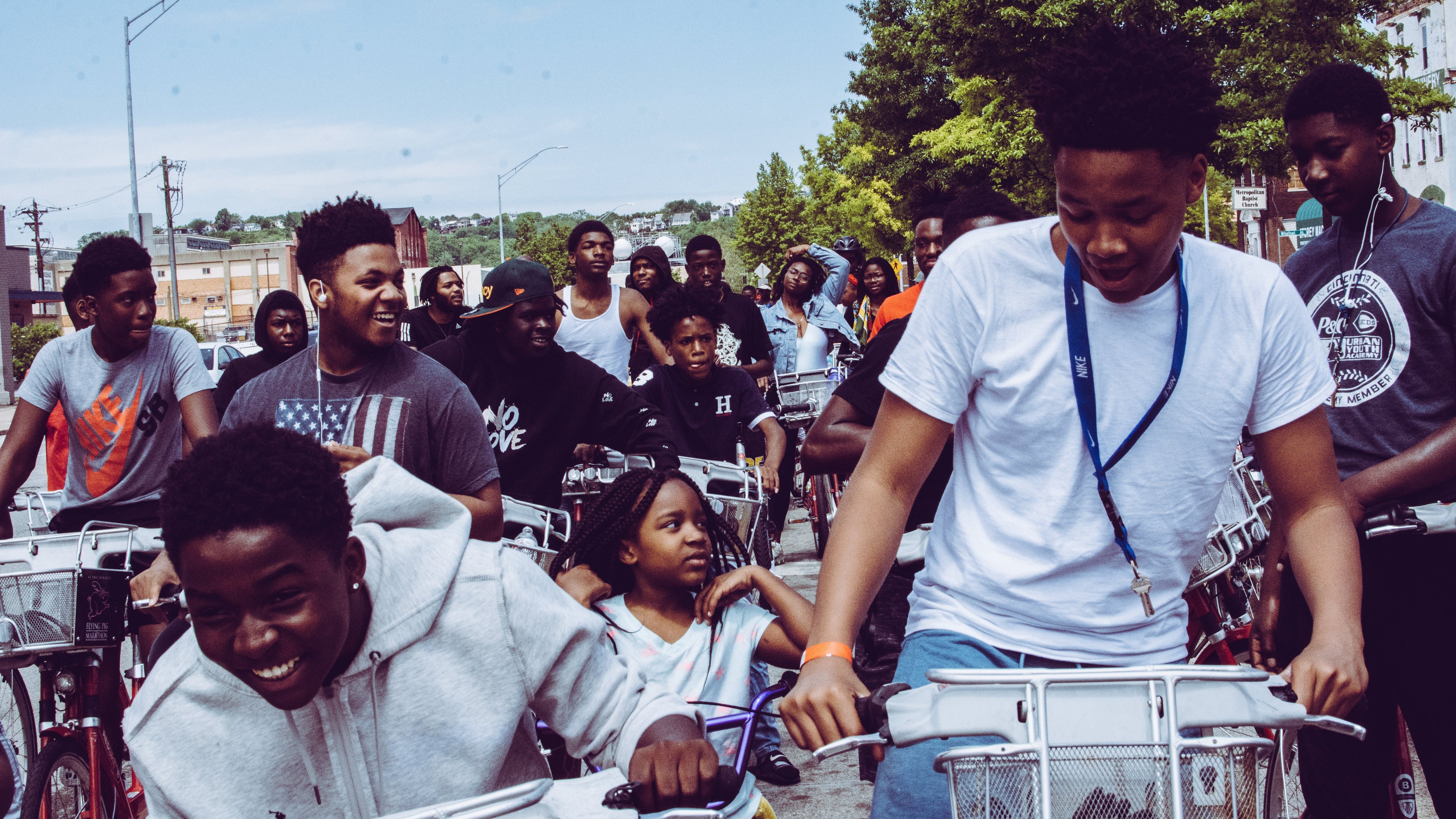 Group of people with bicycles on a sunny day from Pexels by Ahshea 